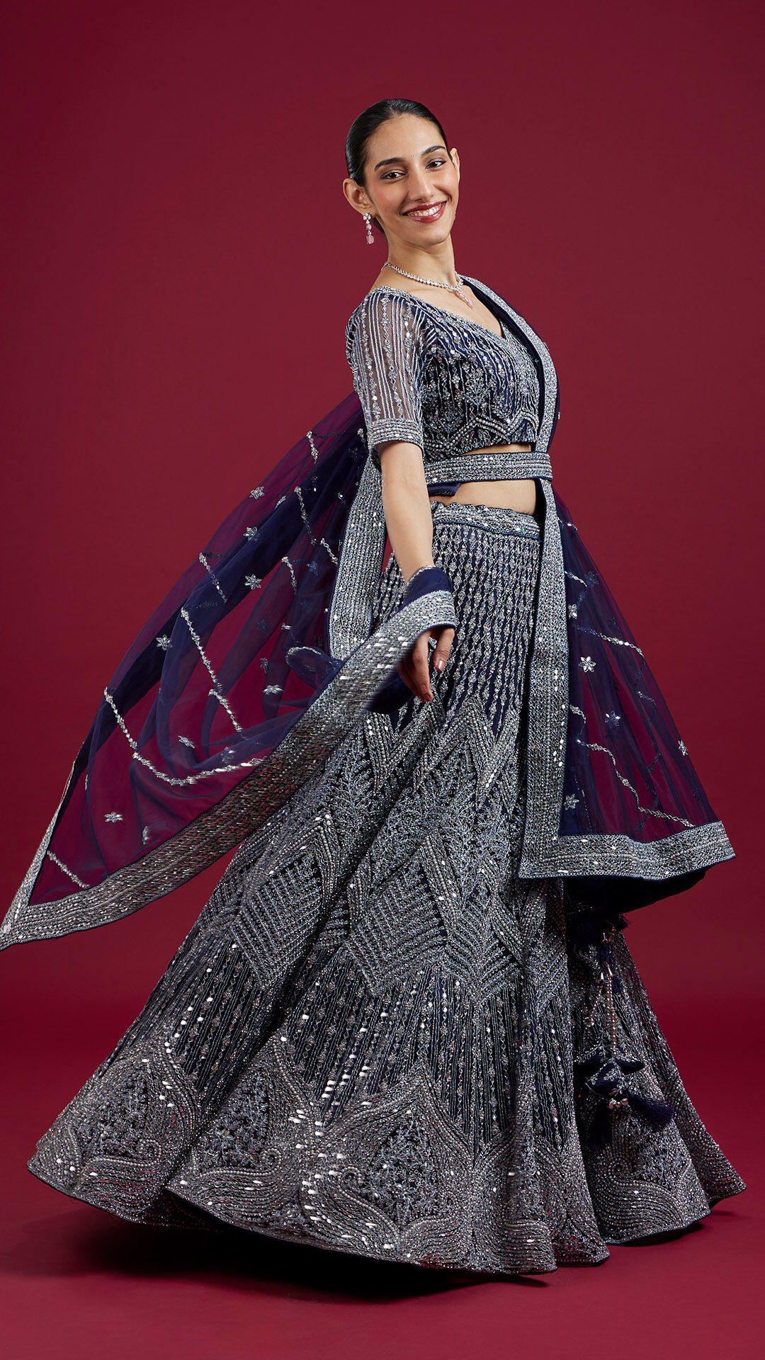 Woman wearing a cape-style dupatta drape